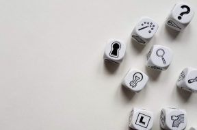 Black-and-white-dice-with-symbols.jpg
