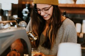 Young-woman-working-at-a-cafe.jpg