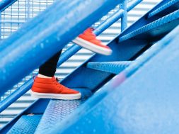 Person-in-red-shoes-walking-up-blue-stairs-.jpg